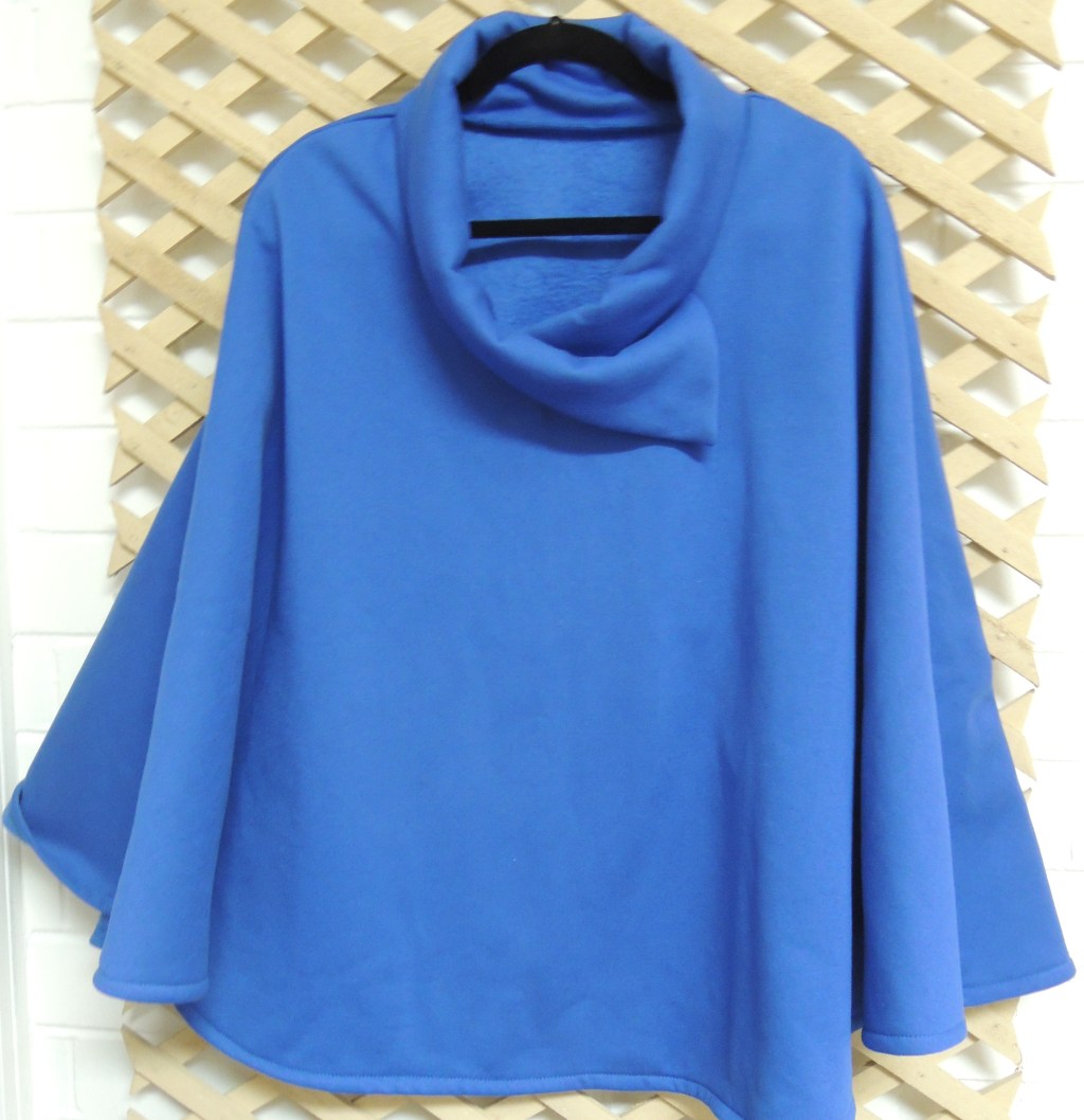 Caring Clothing company cape