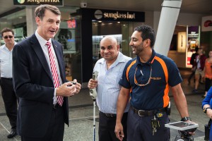 Talking signs - Brisbane Lord Mayor Graham Quirk with client Haroon Probst and GDQ Rehab Manager Bashir Ebrahim