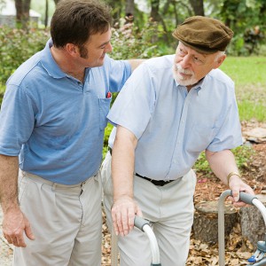 Man-walking-with-older-man