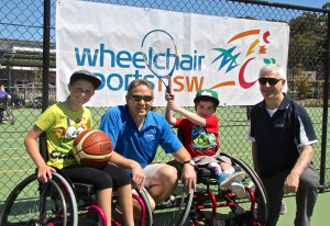 1. Kyrstal Rothery, 14 and Cormack Ryan, 7,  joined by INVACARE MD Geoff Purtill and Jim O'Brien, CEO of Wheelchair Sports NSW
