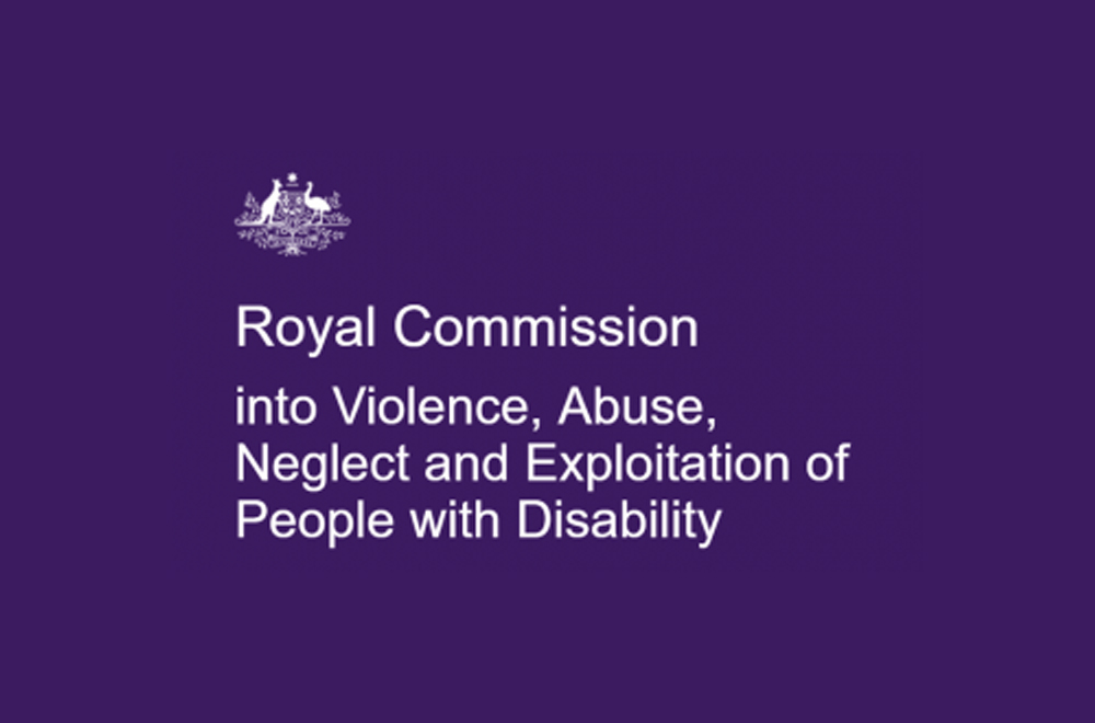 The Disability Royal Commission logo: a purple background with white text with the name of the Commission written on it, saying Royal Commission into Violence, Abuse, Neglect and Exploitation of People with Disability.