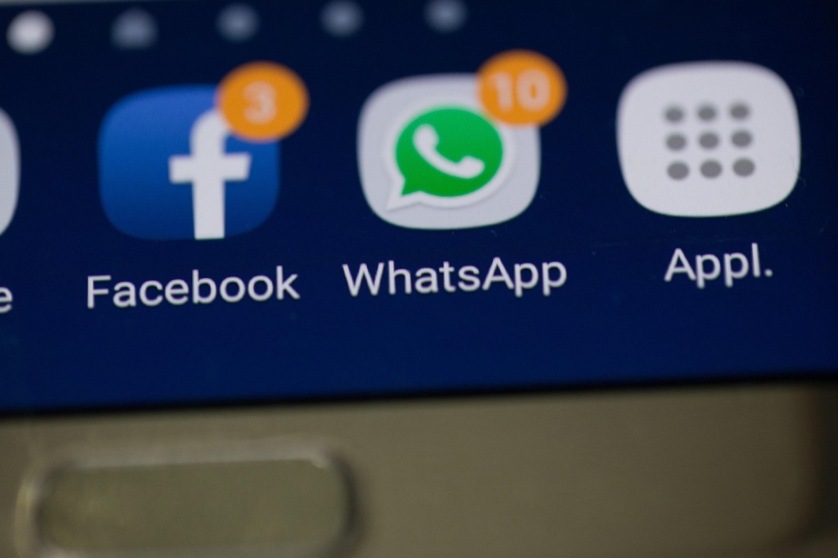 A screen showing two social media app icons, Facebook and Whatsapp.
