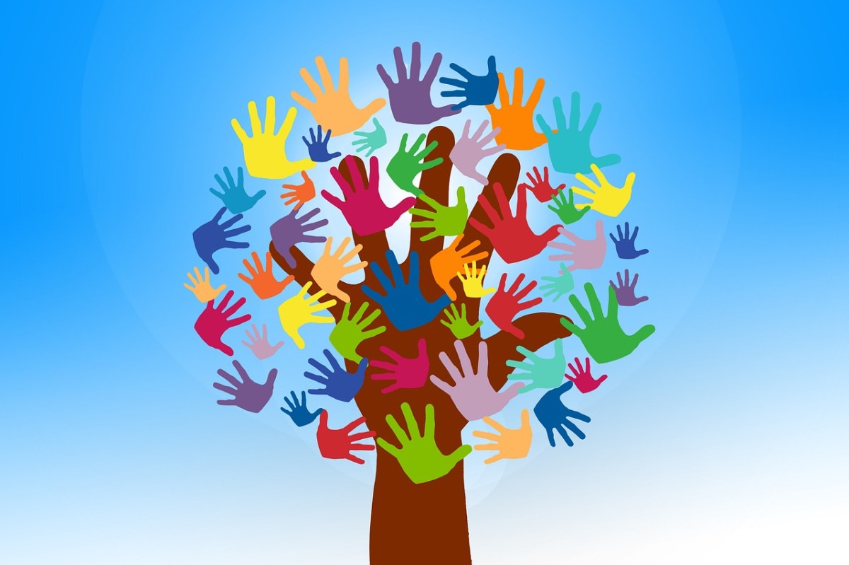 A graphic of a tree with the leaves made of many colourful hands, on a blue background.
