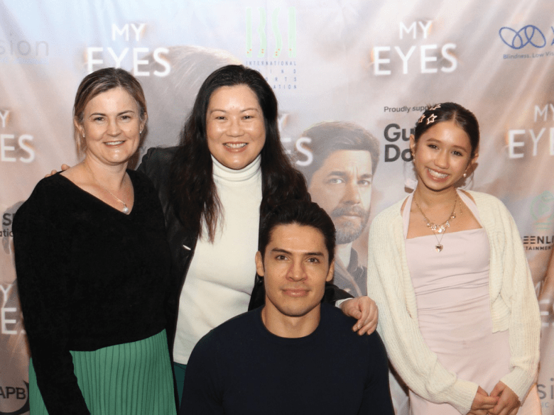 The cast of My Eyes poses at the premiere. They are all dressed up nicely and smiling.