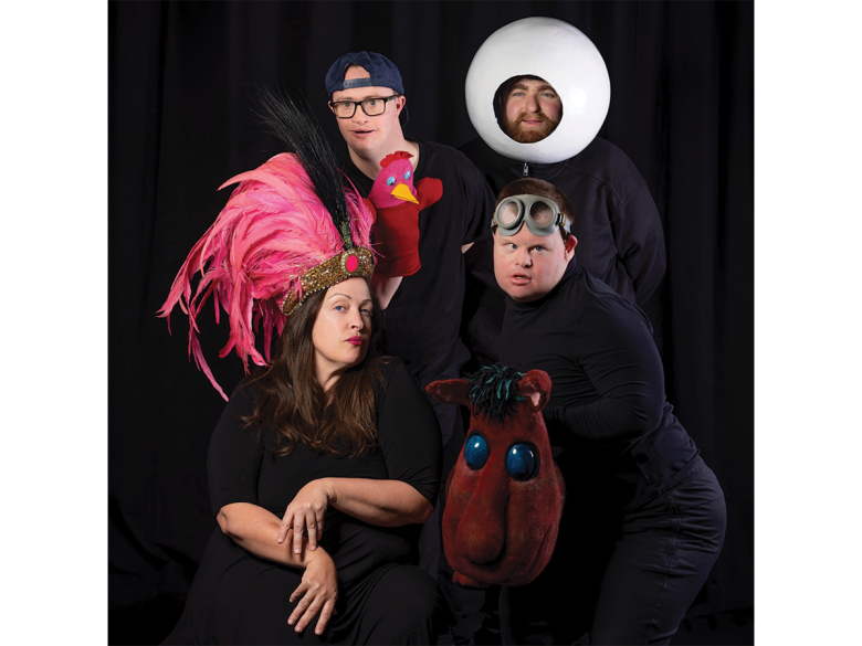 Cast members from Second Echo Ensemble, dressed in their costumes from the Adventures show, look into the camera.