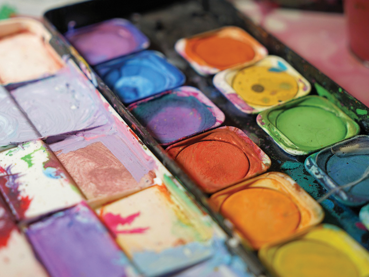 A colourful, rainbow paint palette